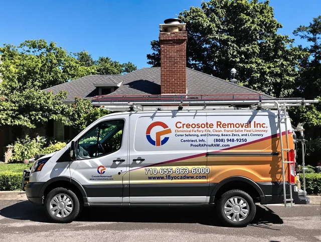 North Smithfield Chimney Sweep technician removing creosote safely in North Smithfield, RI